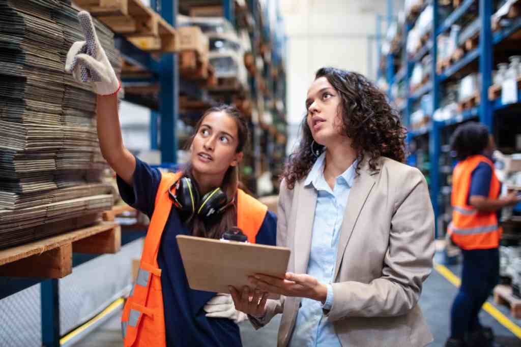 a supervisor managing wholesale inventory in a warehouse