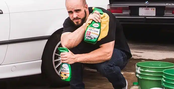 A man with car cleaning products
