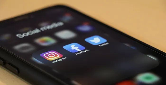 A close up of a black cell phone.