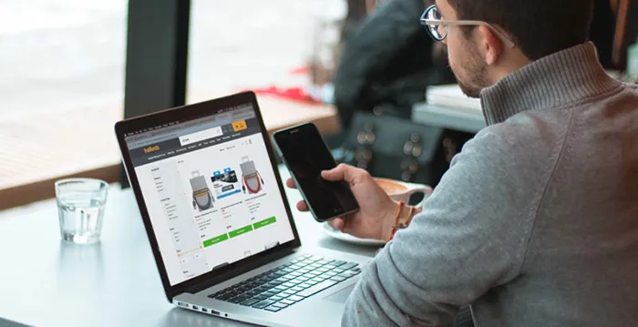 A man using a laptop.