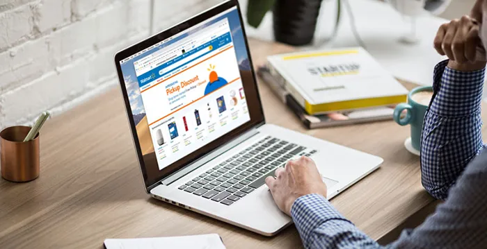 A person working on a laptop.