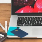 A laptop on a table.