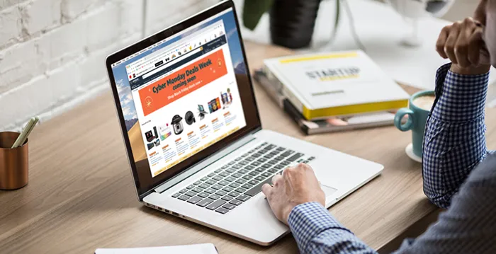 A person working on a laptop.