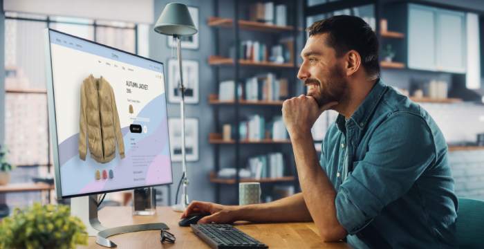 a business owner reviewing the free online store they made