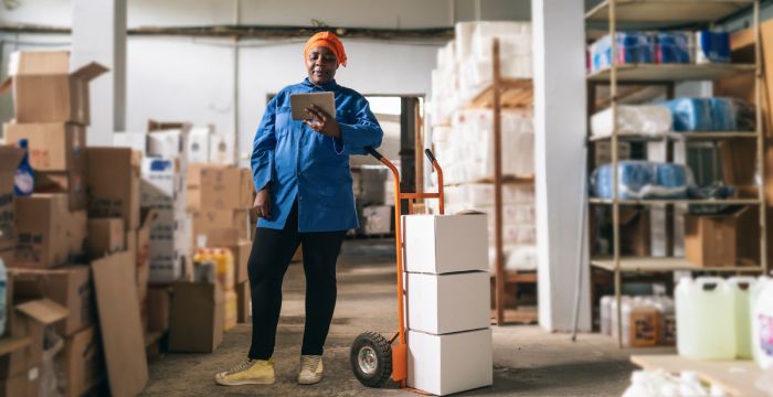 a small business owner using inventory management software