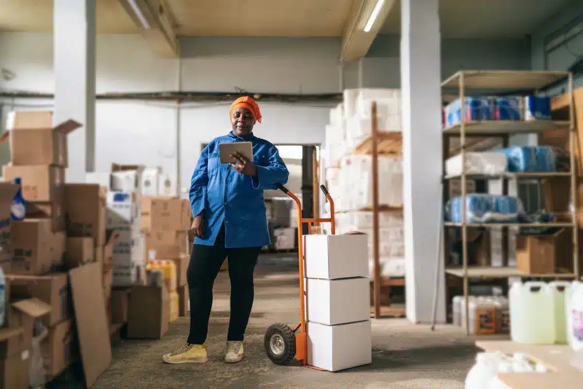 a warehouse worker using a perpetual inventory system