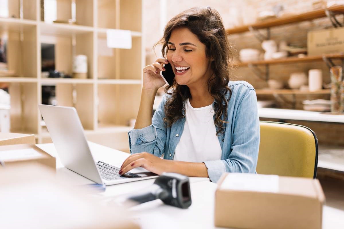 Business owner using inventory management software for woocommerce