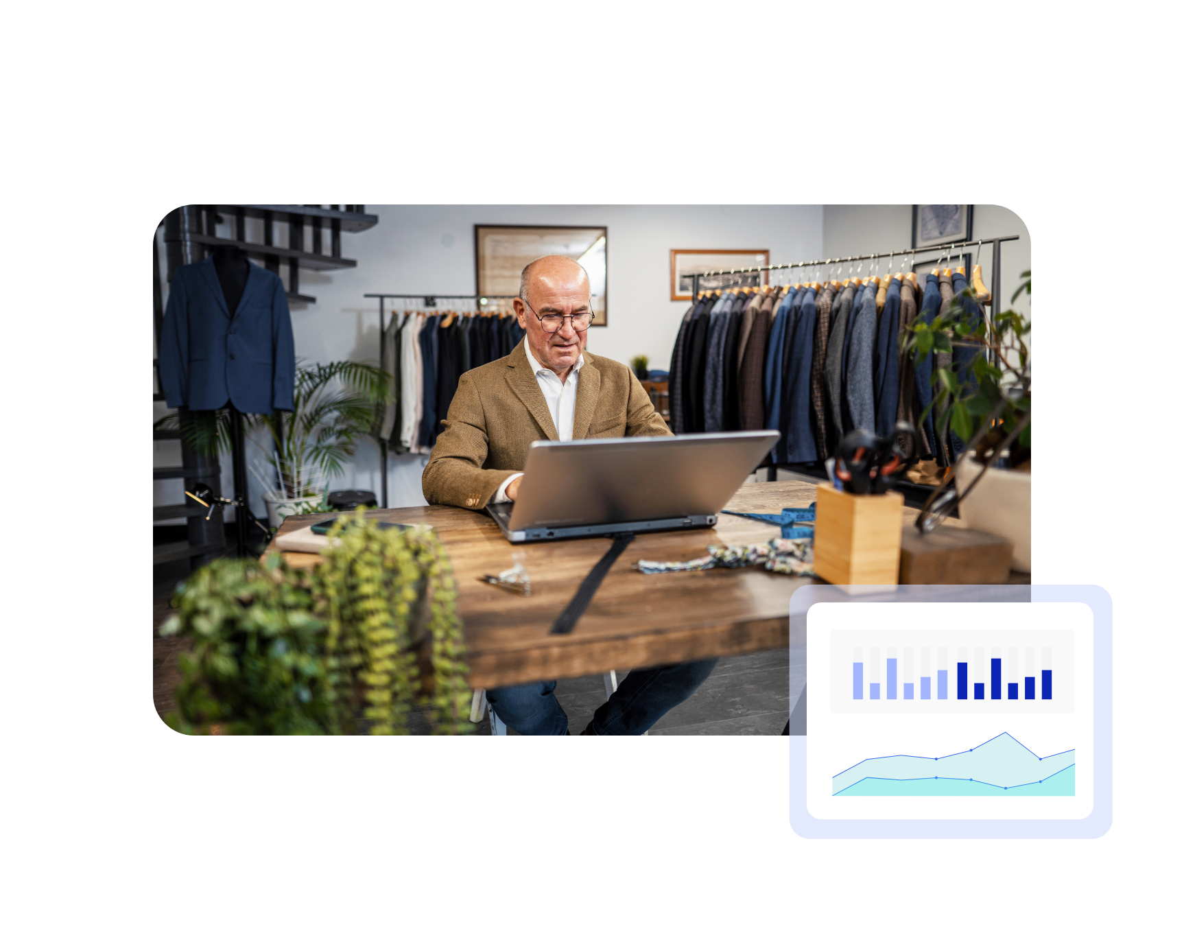 Business owner in a clothing store reviewing sales data and performance charts on a laptop for insight reporting.