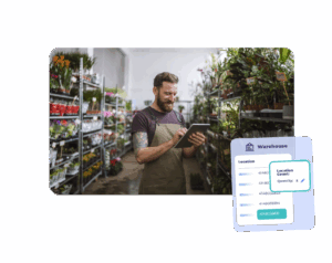 Employee using a tablet to check inventory levels in a plant warehouse, with an overlay showing warehouse location and quantity details for stock forecasting.